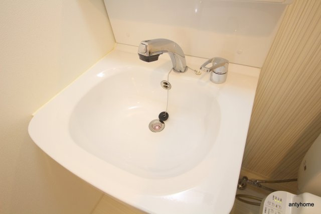 レジュールアッシュ梅田ＮＥＸ　仲介手数料無料の洗面所