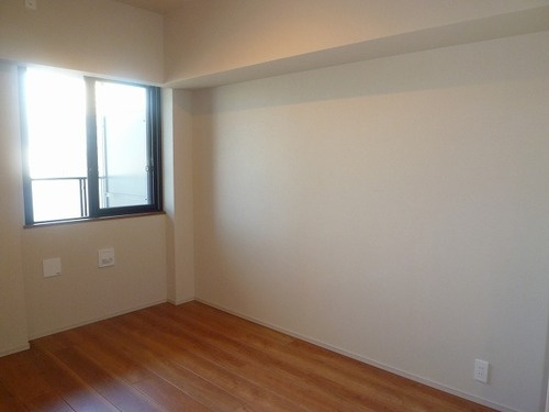 熊本市西区春日３丁目の賃貸マンションの洋室