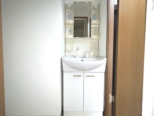 マリベール比島の洗面所|こちらの居間で趣味の時間をお楽しみください