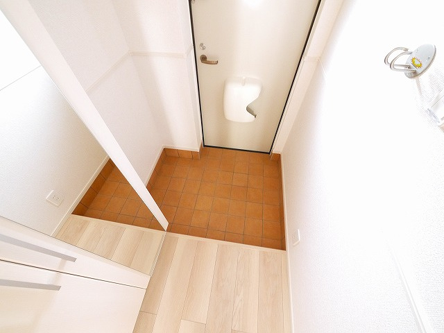 クレメント木津八ヶ坪Ｂの玄関