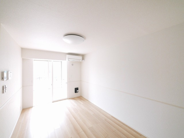 クレメント木津八ヶ坪Ｂの居間・リビング