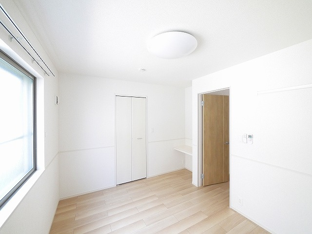 クレメント木津八ヶ坪Ｂの居間・リビング