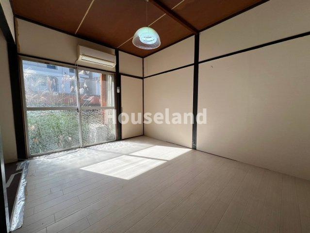 六十谷マンションの洋室