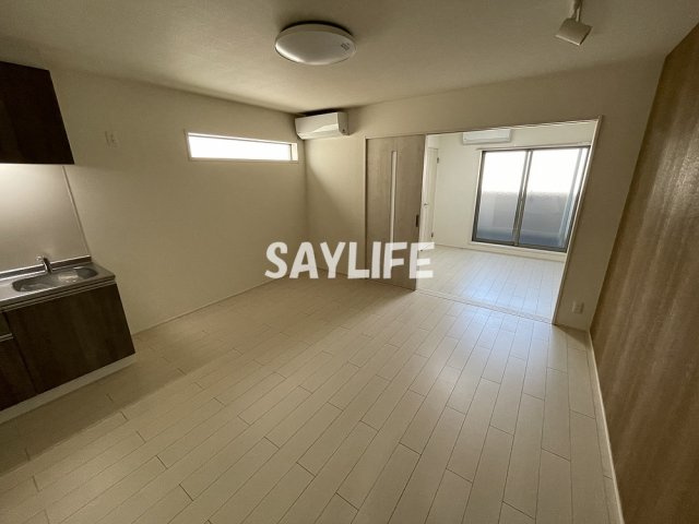 フジパレス高井田西Ⅲ番館の居間・リビング