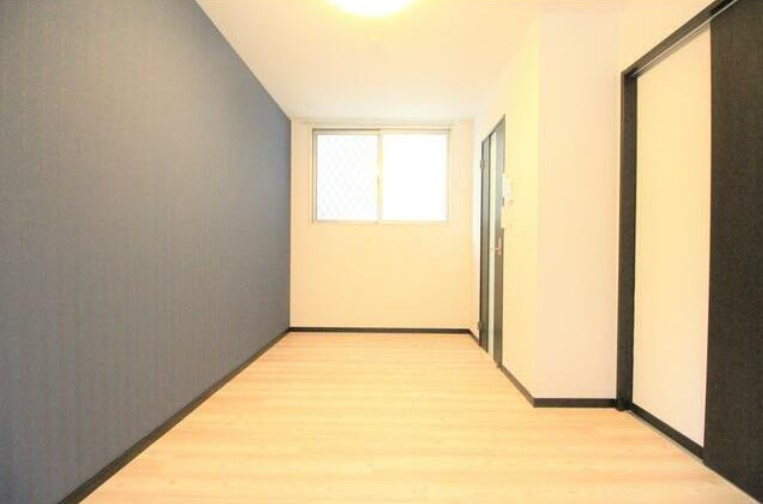 府中市八幡町３丁目のアパートの寝室