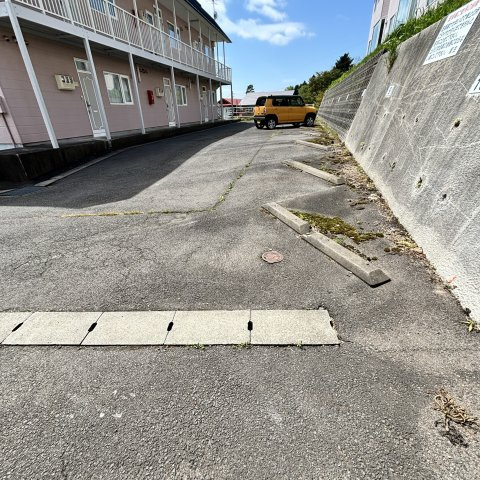 コーポスワンAの駐車場