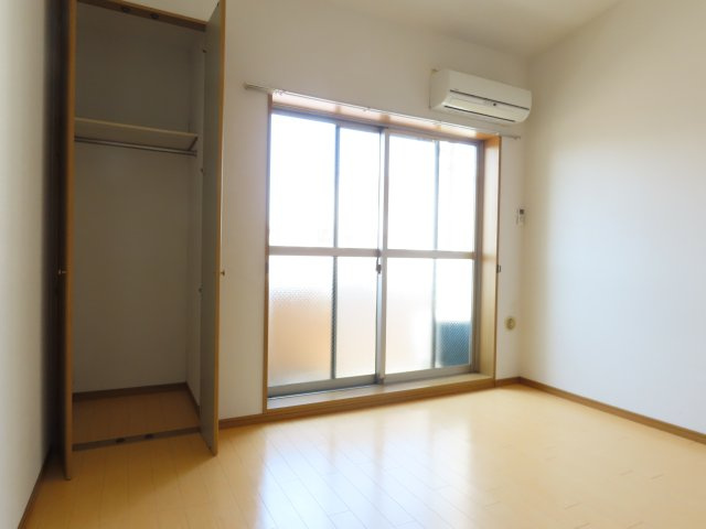 プルス新北野の寝室