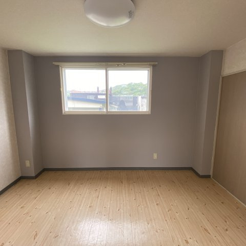 アーバンハイツ輪西の洋室