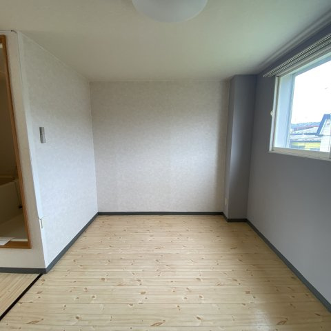 アーバンハイツ輪西の洋室