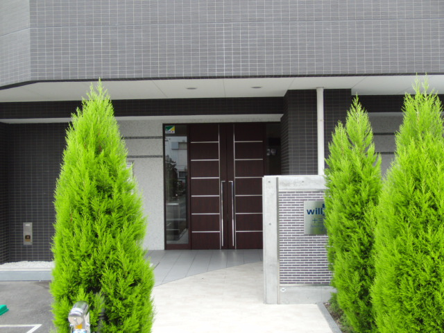 大阪市淀川区十三東３丁目の賃貸マンションのエントランス