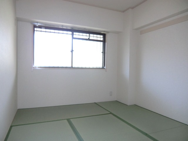 大阪市淀川区三津屋南２丁目の賃貸マンションの寝室