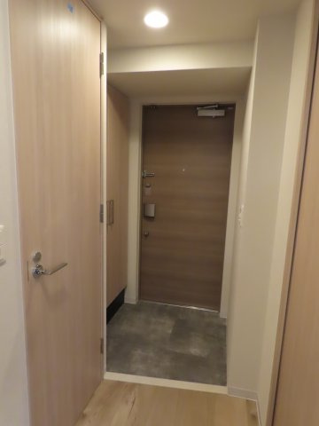 大阪市淀川区十三東４丁目の賃貸マンションの玄関