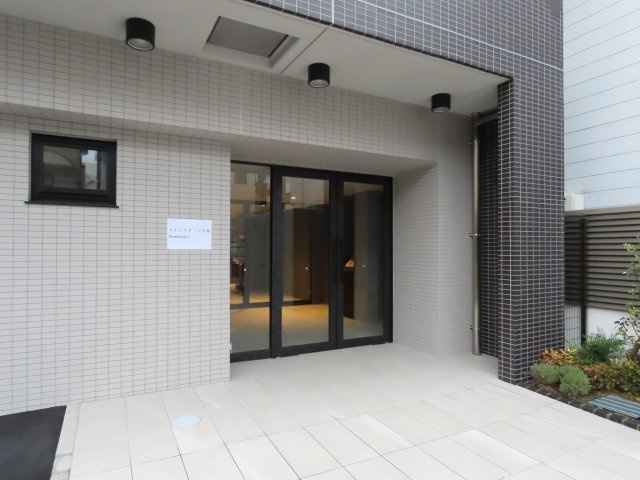 大阪市淀川区十三東４丁目の賃貸マンションのロビー