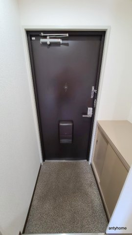 メゾンドスピカ　仲介手数料無料の玄関