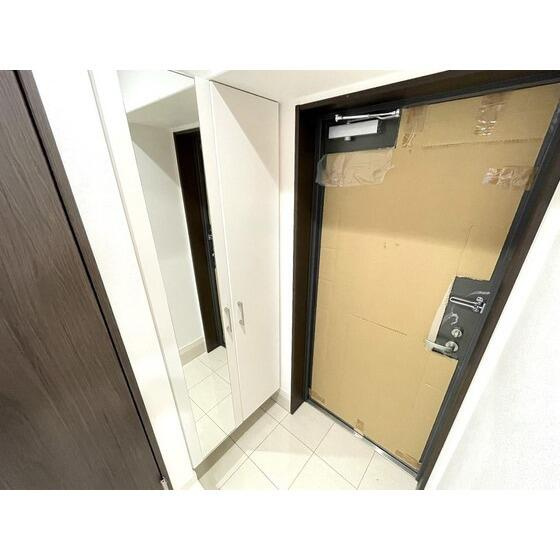 熊本市中央区新町３丁目の賃貸マンションの玄関