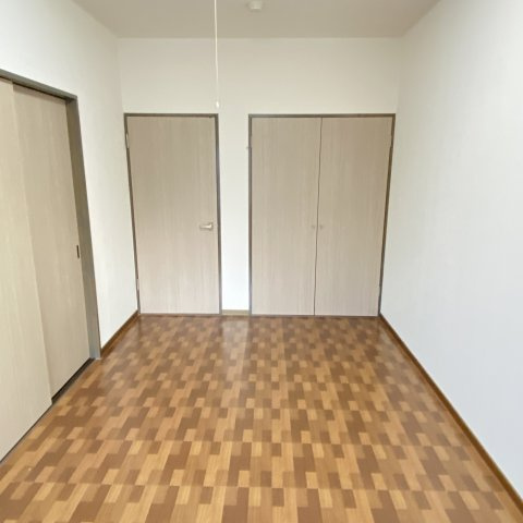 グローリー新生の洋室