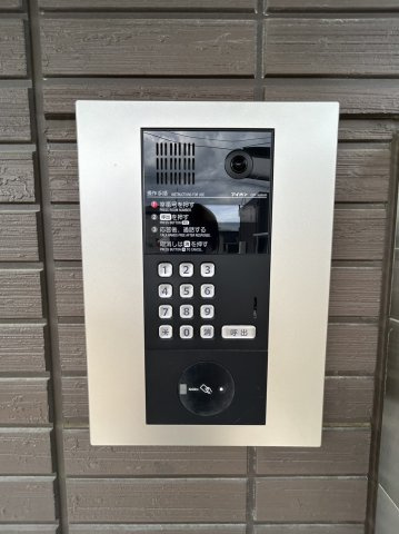 プレザントハウスM8のエントランス