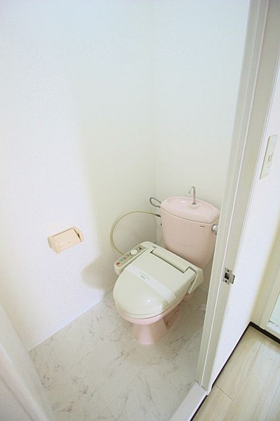 久留米市西町の賃貸マンションのトイレ|落ち着いた色調のトイレです