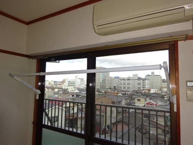 波田マンションの寝室|室内物干し