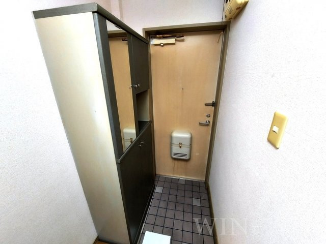 プチメゾン東小鷹野の玄関