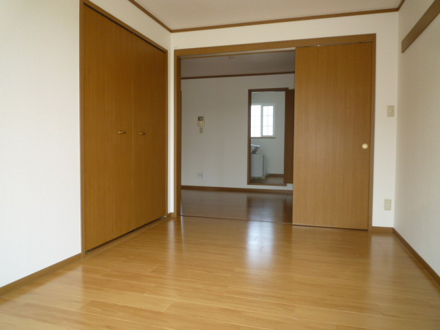 メゾンドソレイユＡの居間・リビング