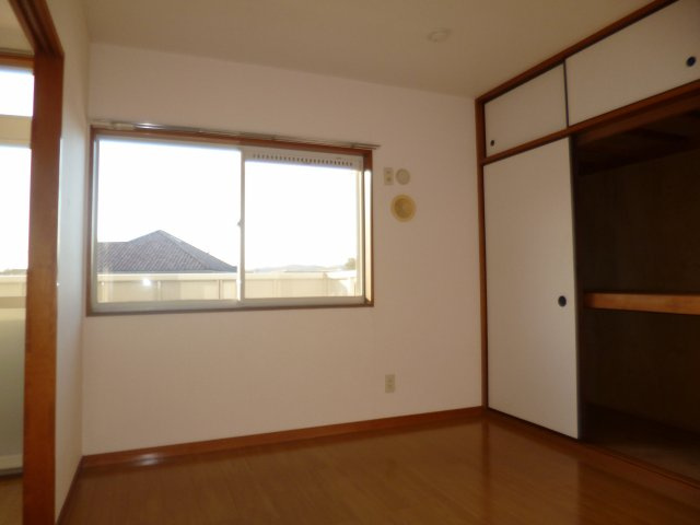 くらしきグリーンハイツの寝室|洋室