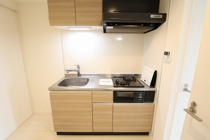 エキスポコンフォート Ⅱのキッチン|システムキッチン（2口ガスコンロ付き）