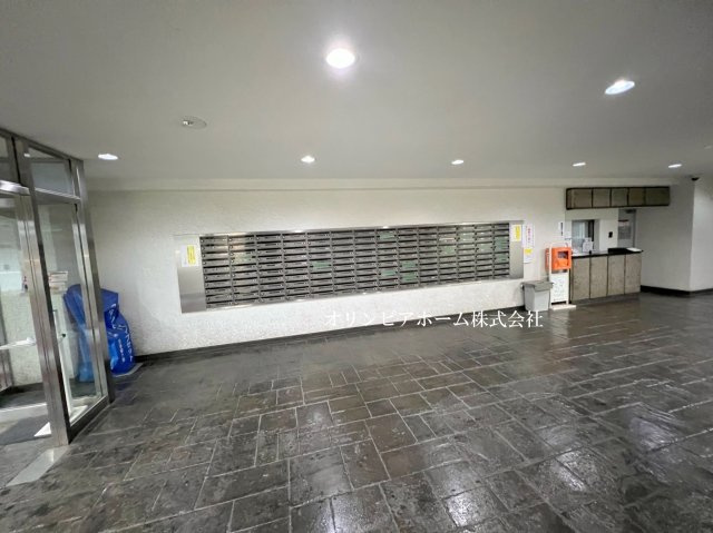トーカンマンション大島Ｃ棟　11階　角　部屋　ルーフバルコニー付のエントランス