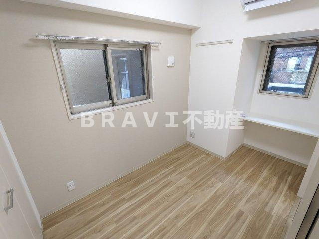 ラフィット松屋町 BRAVI不動産の寝室