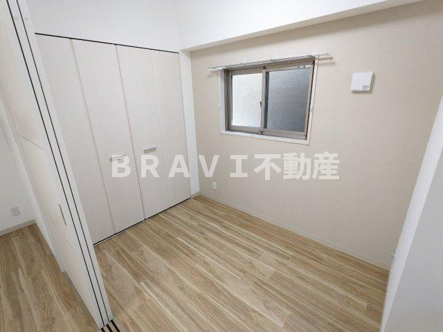 ラフィット松屋町 BRAVI不動産の寝室