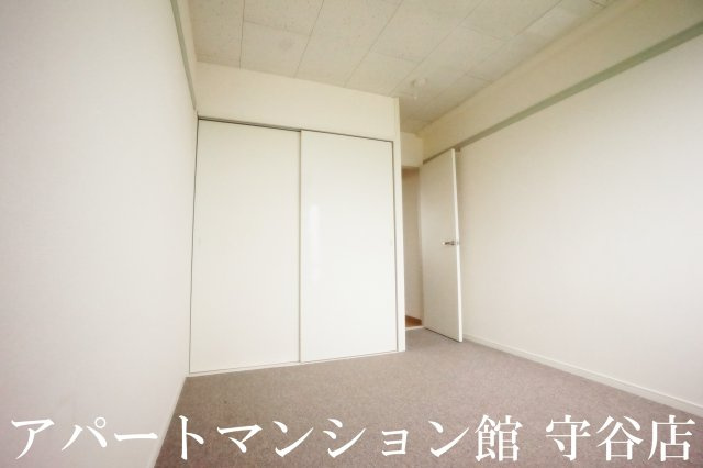 レオパレス吉春の寝室