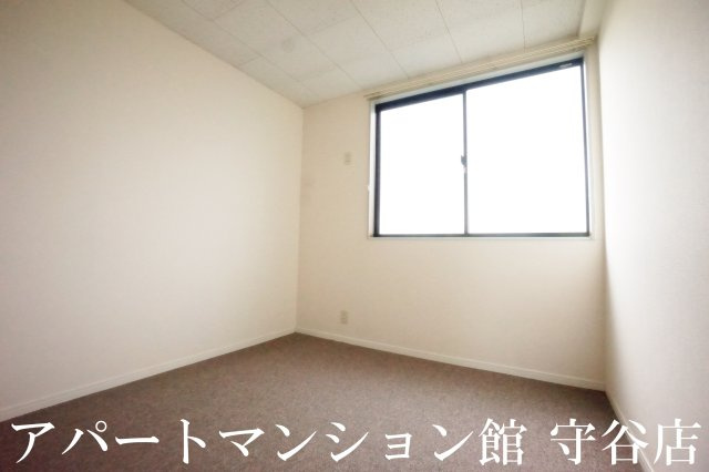 レオパレス吉春の寝室