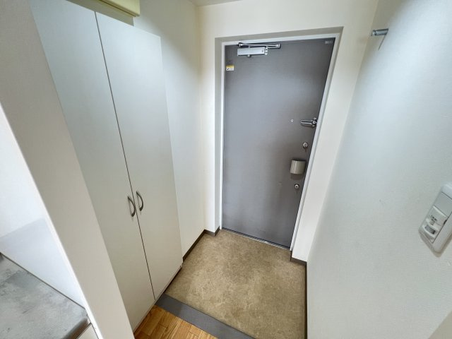 エイムオーエス島崎町マンションの玄関