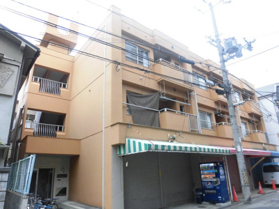 【外観】 | コーポ小松 | オレンジ色の明るい外観です。