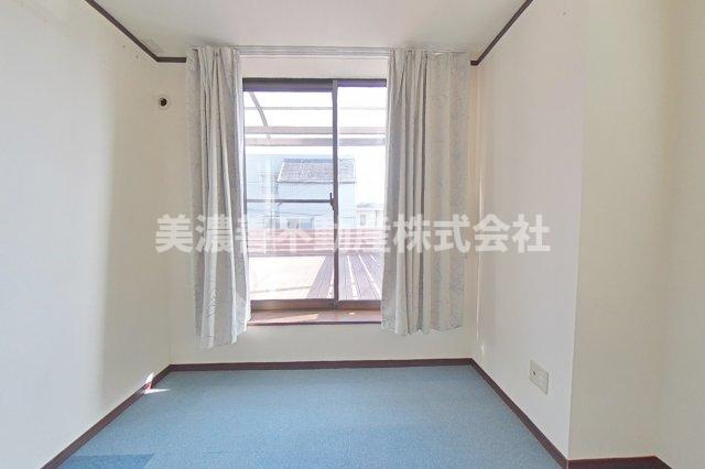 ６０６７７　岐阜市中川原事務所付住居の洋室