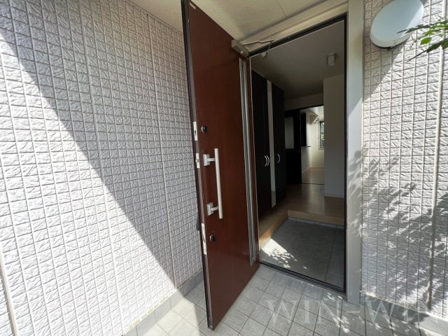 コンフォートヒルズ小鷹野の玄関