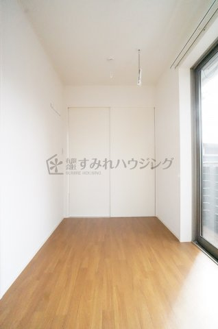 マ・メゾン川西の寝室