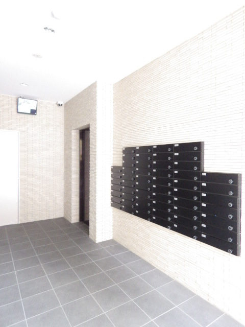 熊本市中央区古桶屋町の賃貸マンションのエントランス