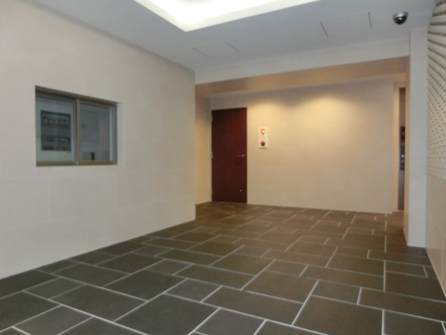 大阪市淀川区十三元今里１丁目の賃貸マンションのロビー