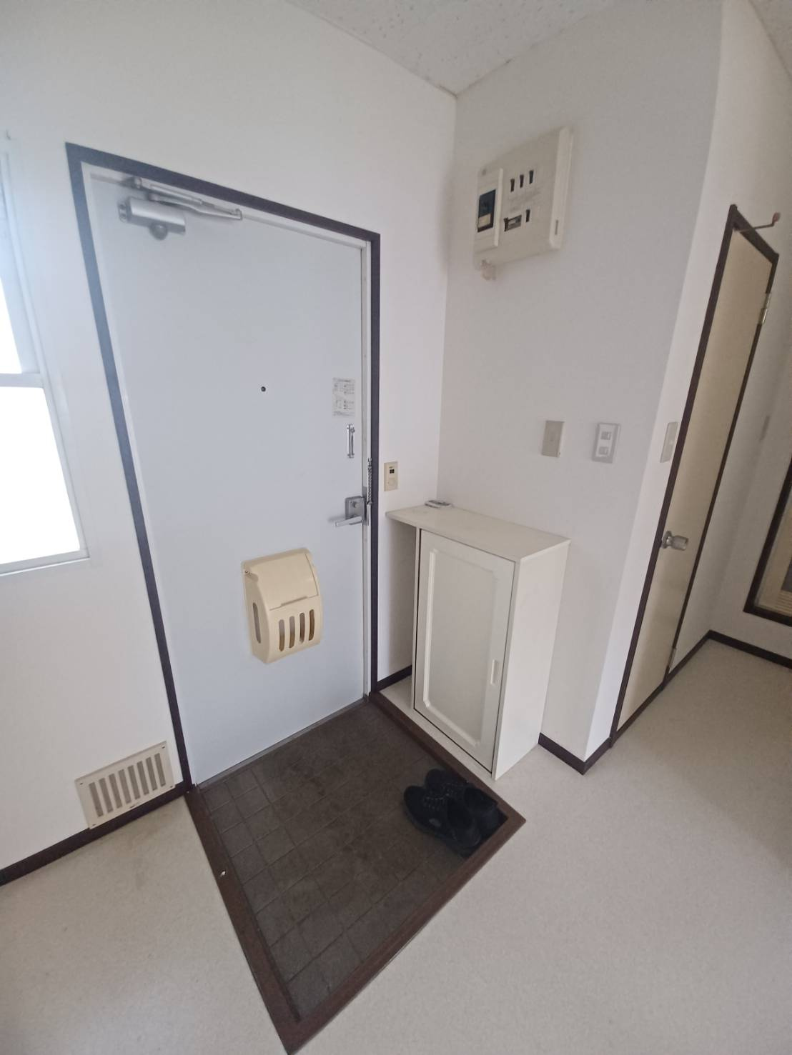 サンシティ江栗の玄関