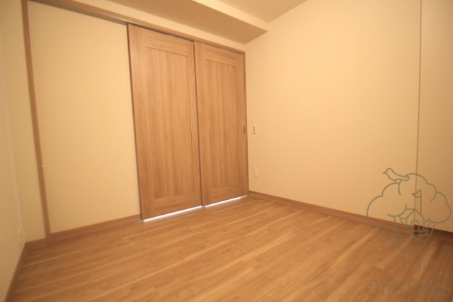 グランドメゾン新梅田タワー THE CLUB RESIDENCEの寝室