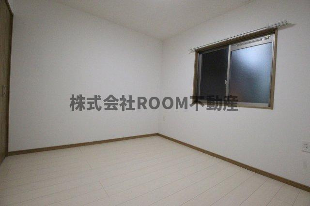 都城市千町の賃貸マンションの洋室