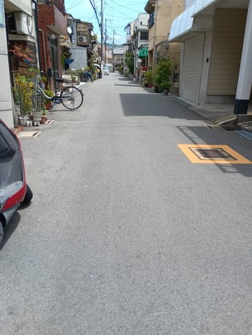 中古戸建　四條畷市中野新町（平成4年築）の前面道路含む現地写真