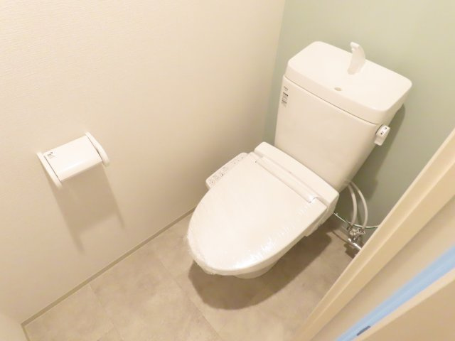 大阪市淀川区十三本町１丁目の賃貸マンションのトイレ