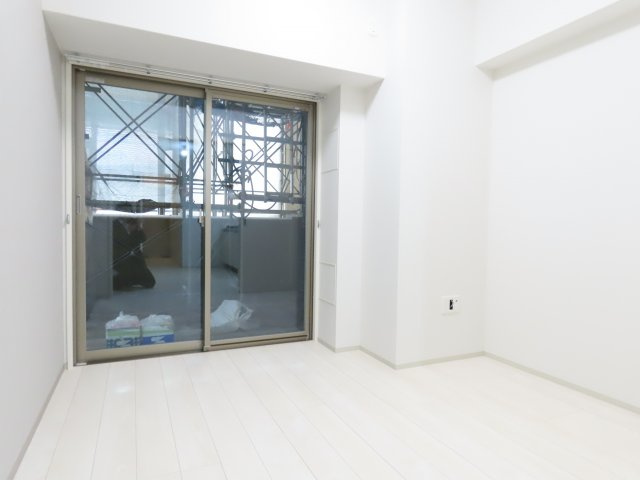 大阪市淀川区十三本町１丁目の賃貸マンションの寝室