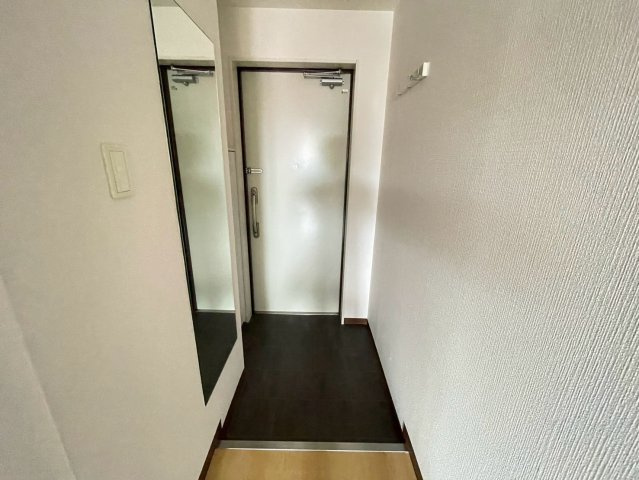 ヴェルドミール小阪の玄関