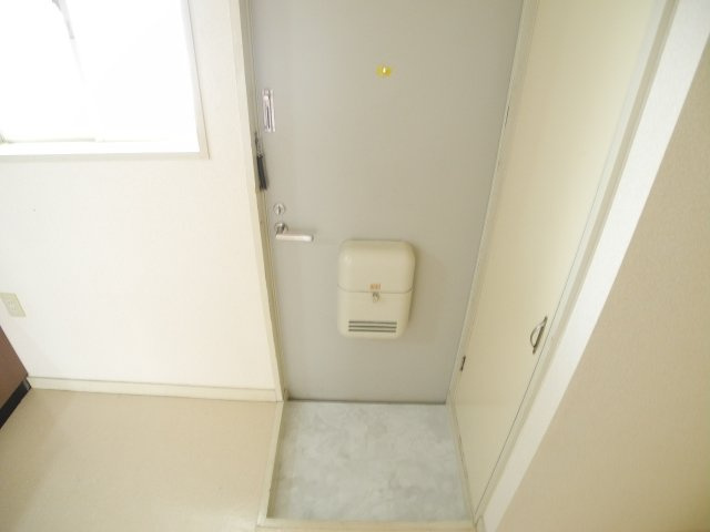 サニーハイツわし崎Aの玄関