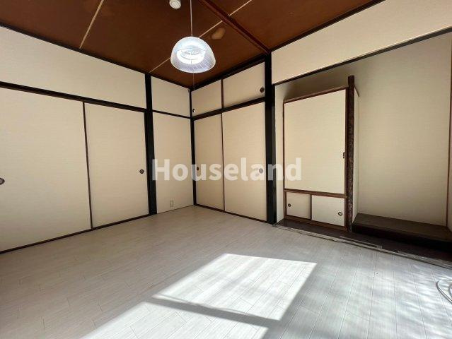 六十谷マンションの洋室