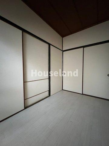 六十谷マンションの洋室