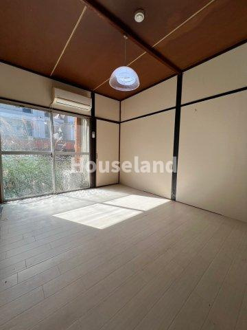 六十谷マンションの洋室